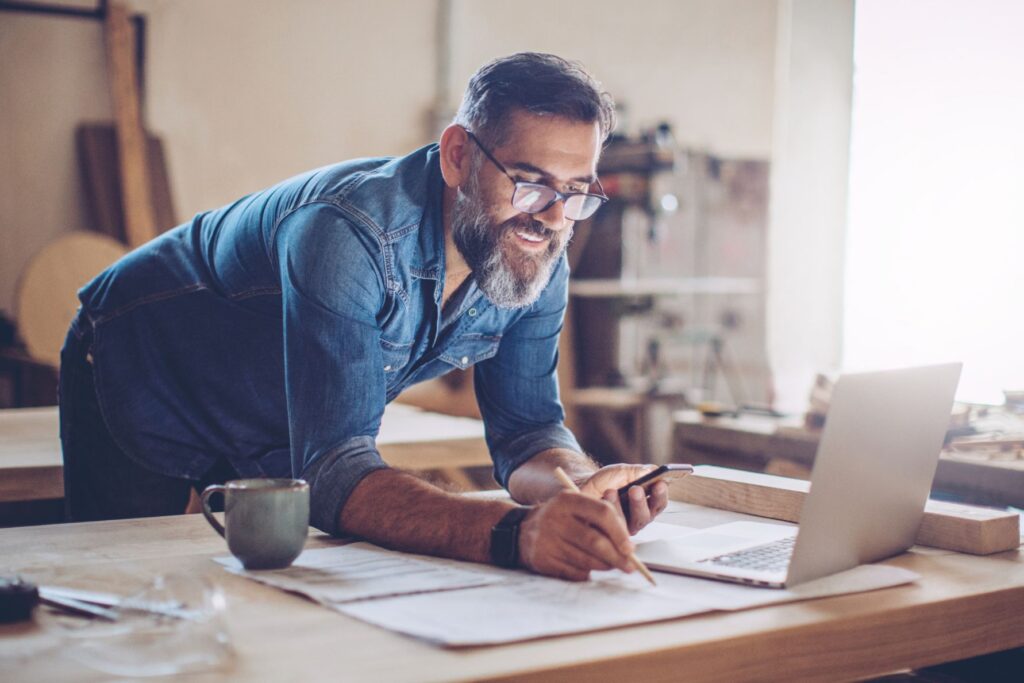 Man looking at SEO strategies technology to improve business